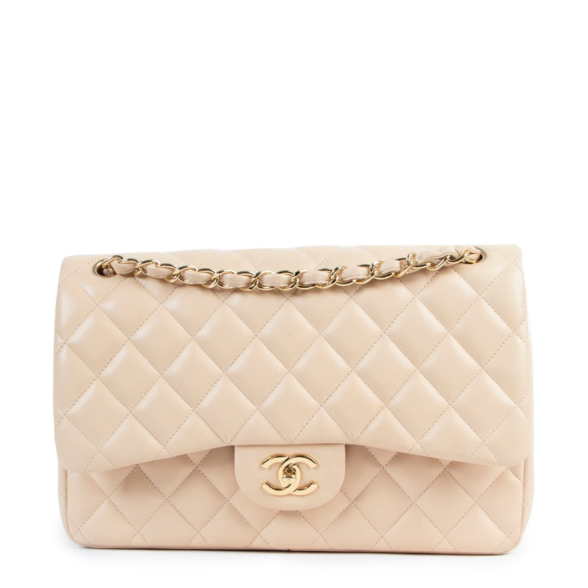 Shop safe online at Labellov in Antwerp this 100% authentic second hand Chanel Beige Classic Jumbo Flap Bag