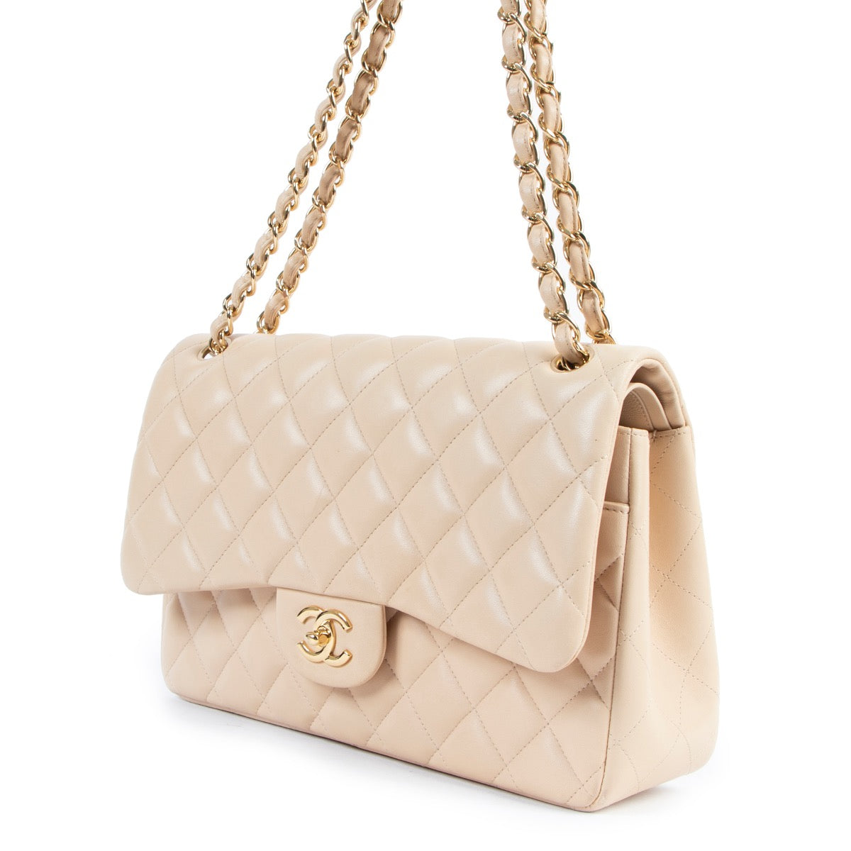 Shop safe online at Labellov in Antwerp this 100% authentic second hand Chanel Beige Classic Jumbo Flap Bag