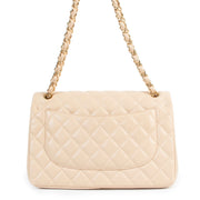 Shop safe online at Labellov in Antwerp this 100% authentic second hand Chanel Beige Classic Jumbo Flap Bag