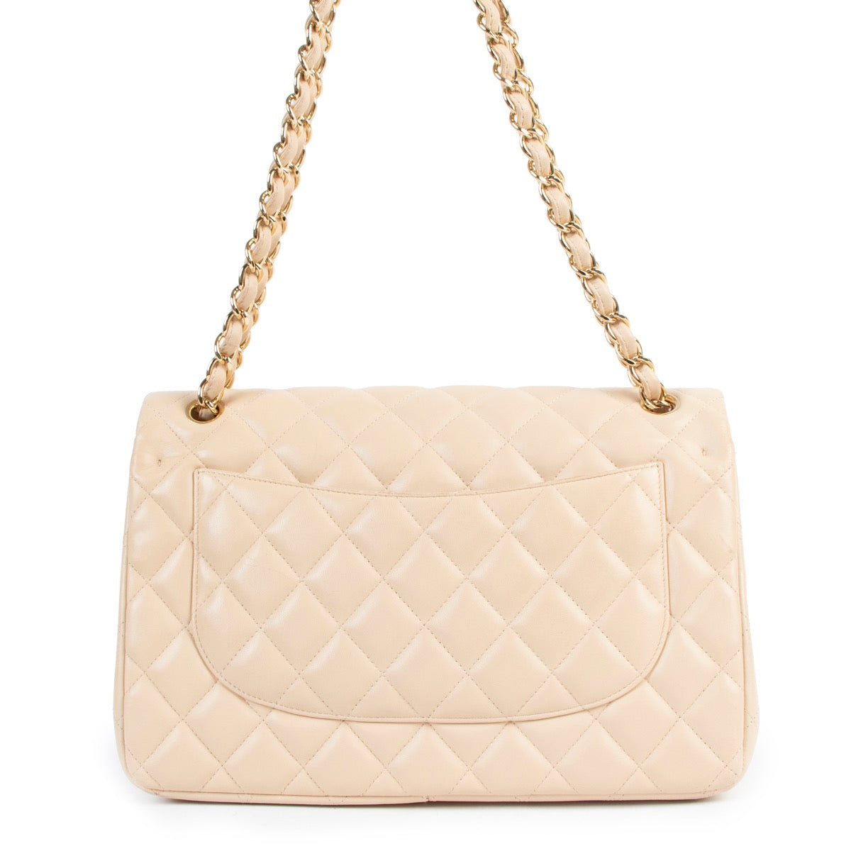 Shop safe online at Labellov in Antwerp this 100% authentic second hand Chanel Beige Classic Jumbo Flap Bag