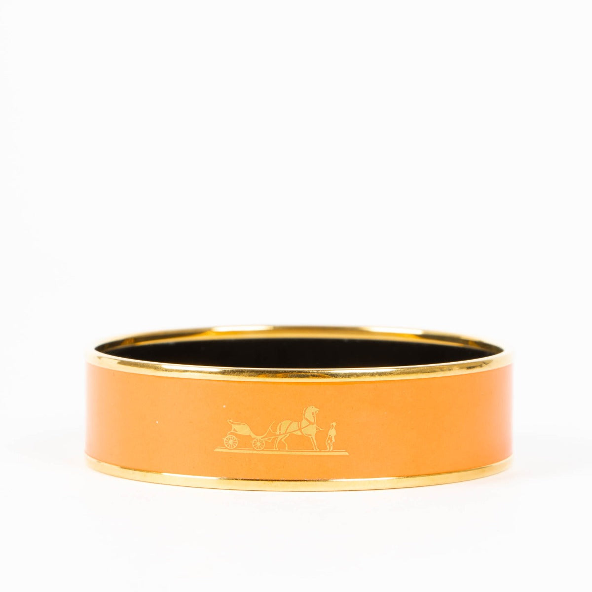 Shop this authentic Hermès Orange Caleche Wide Bangle Bracelet - size 70 pre-loved on Labellov.com