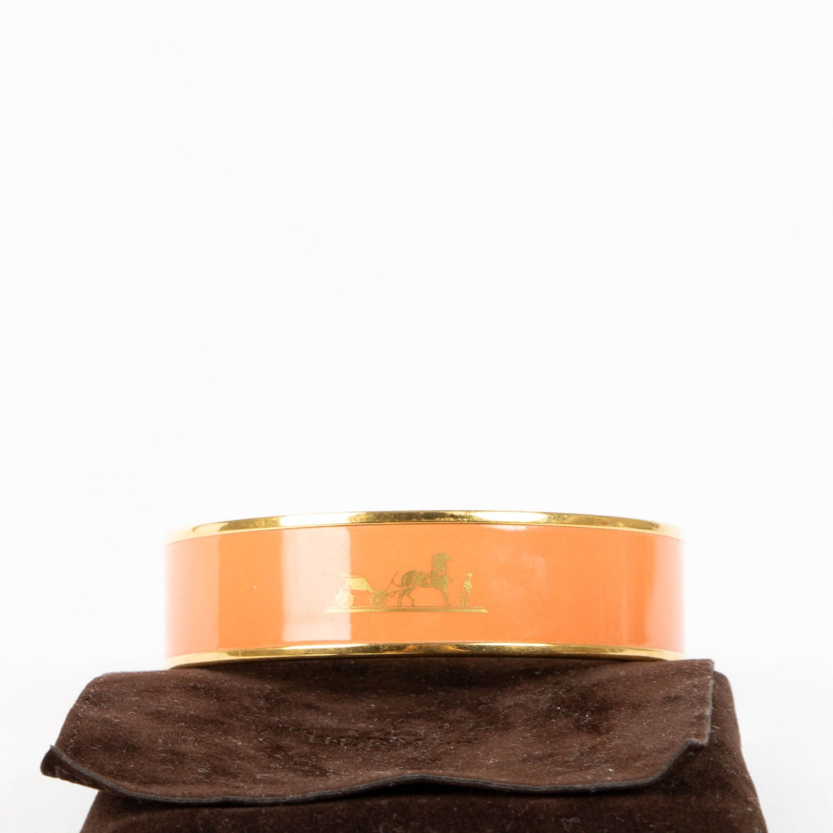 Shop this authentic Hermès Orange Caleche Wide Bangle Bracelet - size 70 pre-loved on Labellov.com