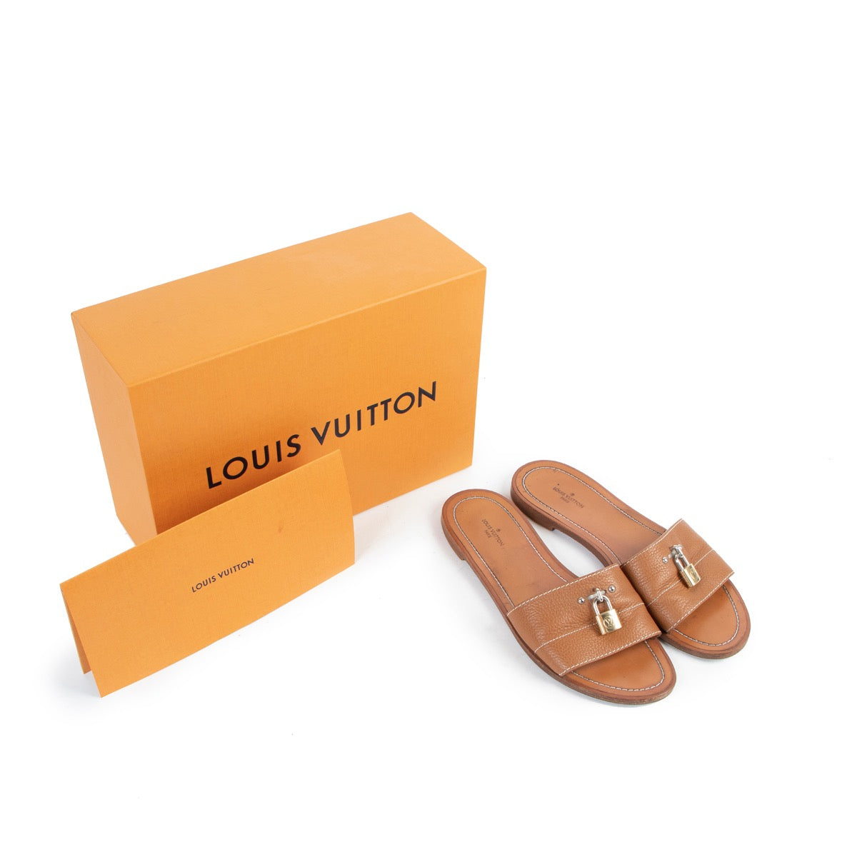 Shop safe online at Labellov in Antwerp this 100% authentic second hand Louis Vuitton Brown Lock It Flats - Size 38