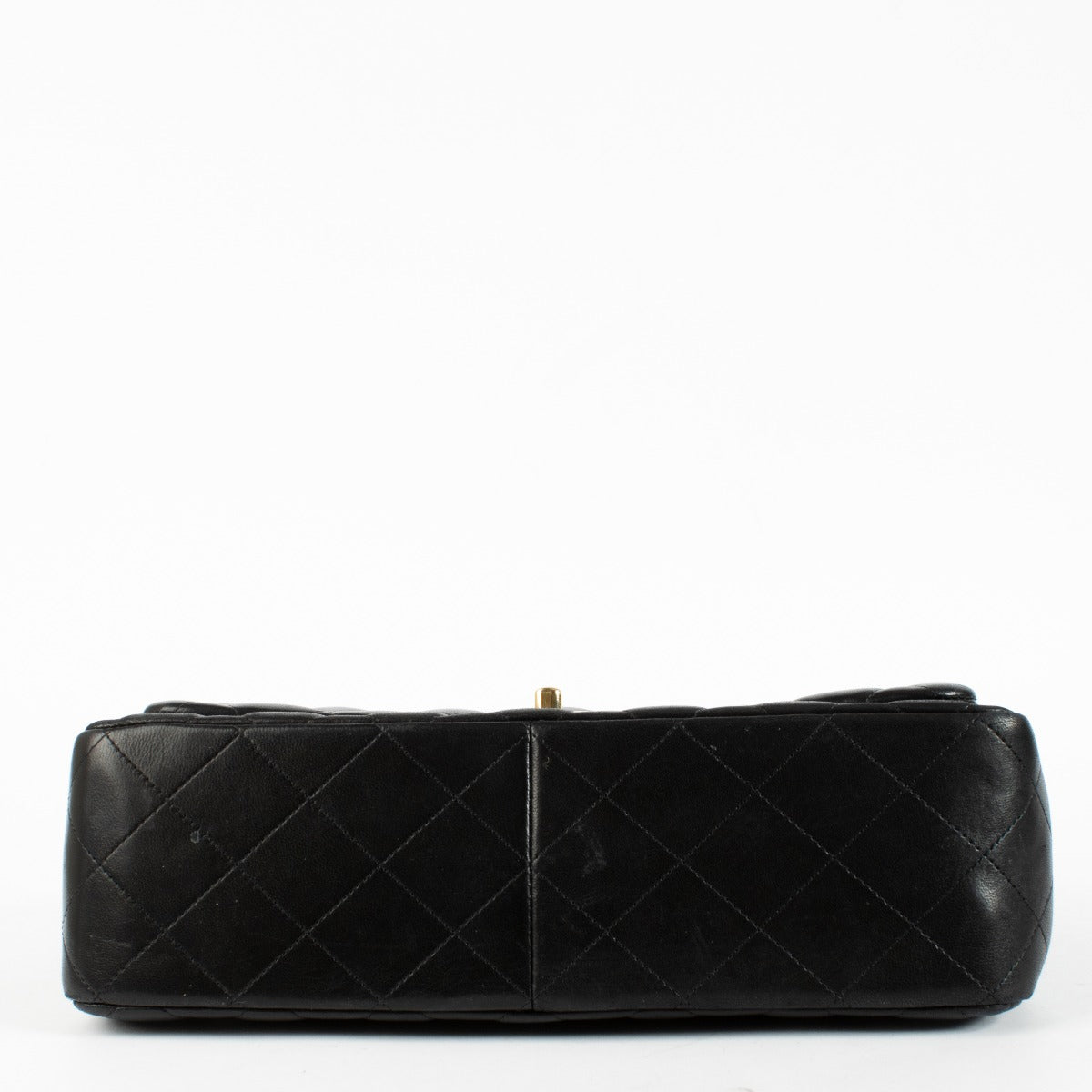 Chanel Black Jumbo Classic Flap Bag in lambskin with gold hardware at Labellov.com