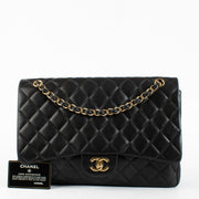 Chanel Black Maxi Classic Single Flap Bag with gold hardware at Labellov.com