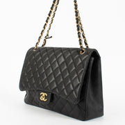 Chanel Black Maxi Classic Single Flap Bag with gold hardware at Labellov.com