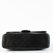 Chanel Black Maxi Classic Single Flap Bag with gold hardware at Labellov.com