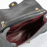 Chanel Black Maxi Classic Single Flap Bag with gold hardware at Labellov.com