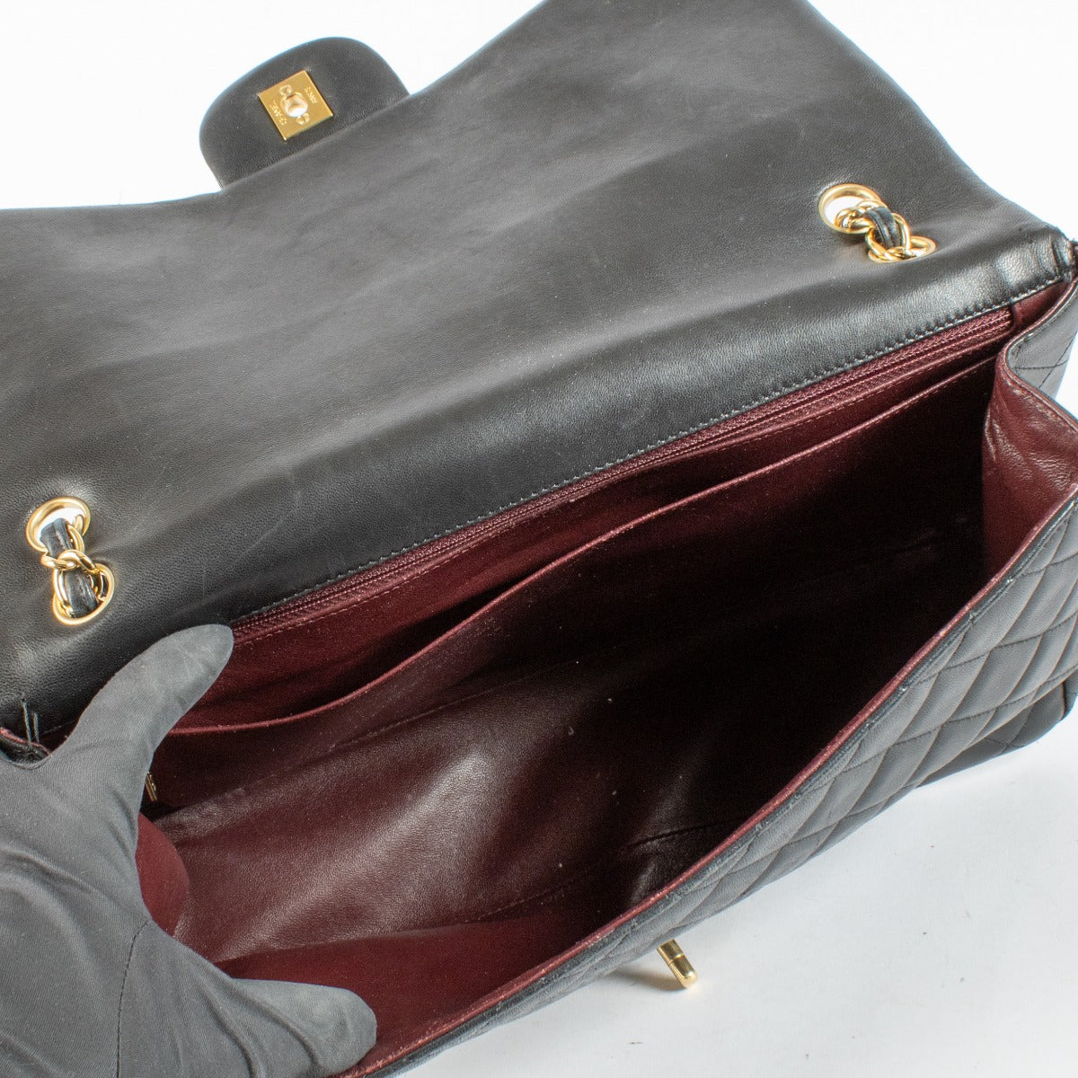 Chanel Black Maxi Classic Single Flap Bag with gold hardware at Labellov.com