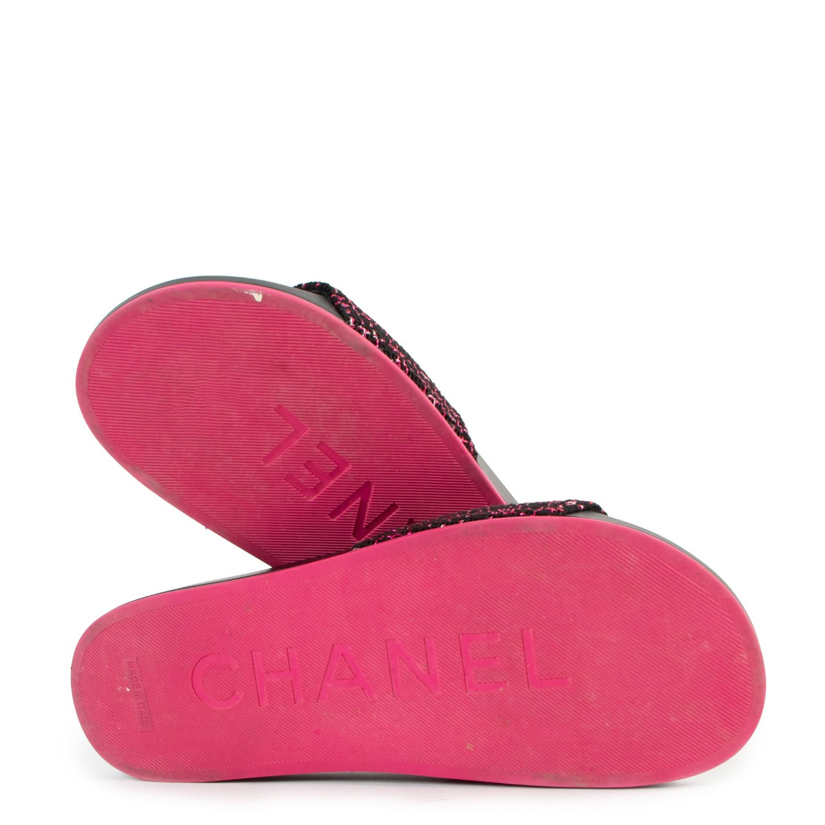 Buy online authentic second hand Chanel Black And Pink Tweed Camellia CC Slides in very good condition at Labellov in Antwerp.