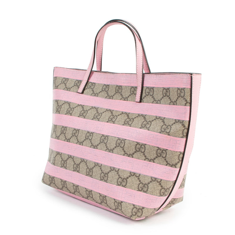 Buy online an authentic second hand Gucci Pink Striped GG Supreme Top Handel Bag in very good condition at Labellov in Antwerp.