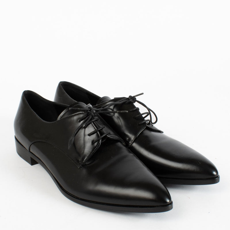 Authentic second-hand Prada Black Leather Flats - Size 38 1/2 on labellov.com