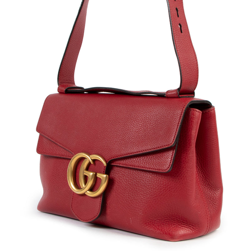 Gucci Red GG Marmont Large Shoulder Bag for the best price at Labellov secondhand luxury in Antwerp. We buy and sell your authentic designer bags online.