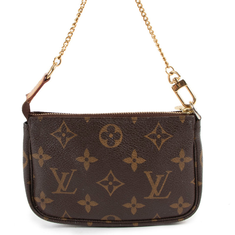 Buy an authentic second hand Louis Vuitton Monogram Mini Pochette Accessoires in very good condition at Labellov