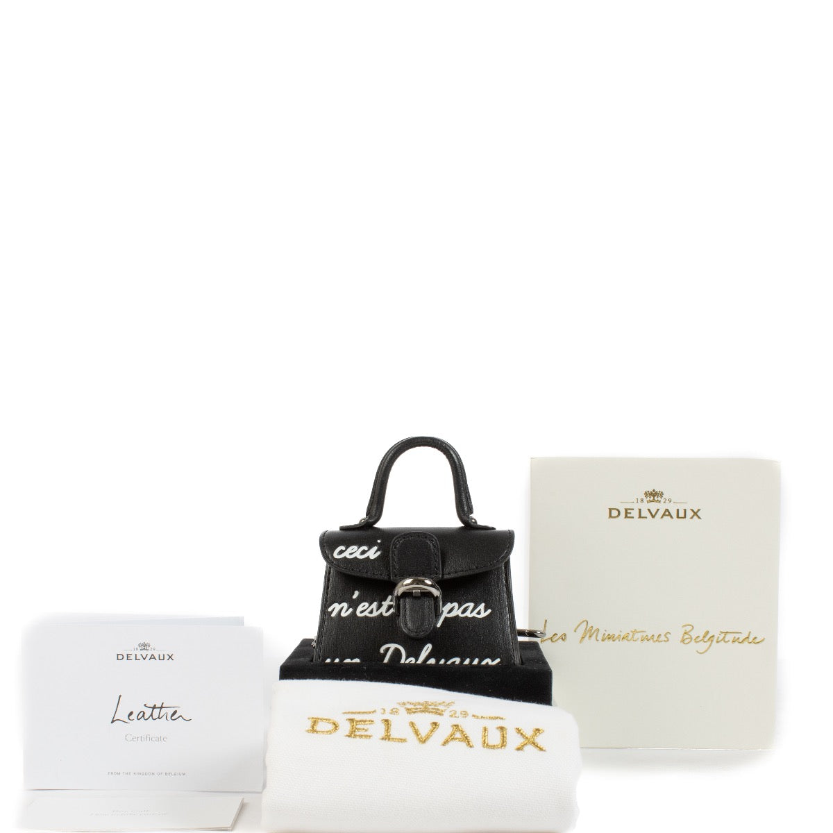 Authentic second hand Delvaux Black L'humour Bag Charm on Labellov.com