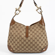 Authentic preloved Gucci GG Canvas Piston Lock Medium Jackie bag on Labellov.com