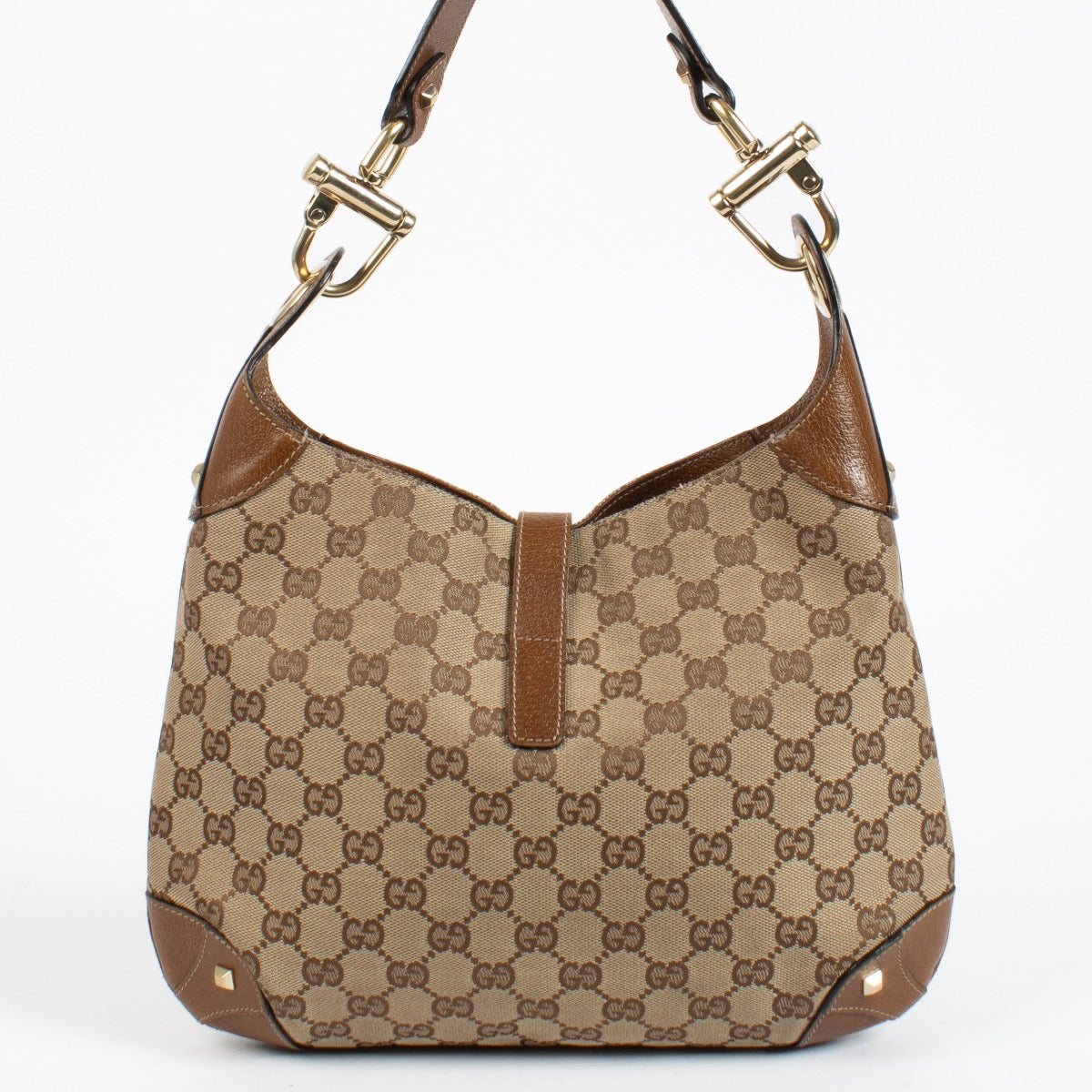 Authentic preloved Gucci GG Canvas Piston Lock Medium Jackie bag on Labellov.com