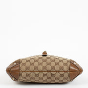 Authentic preloved Gucci GG Canvas Piston Lock Medium Jackie bag on Labellov.com