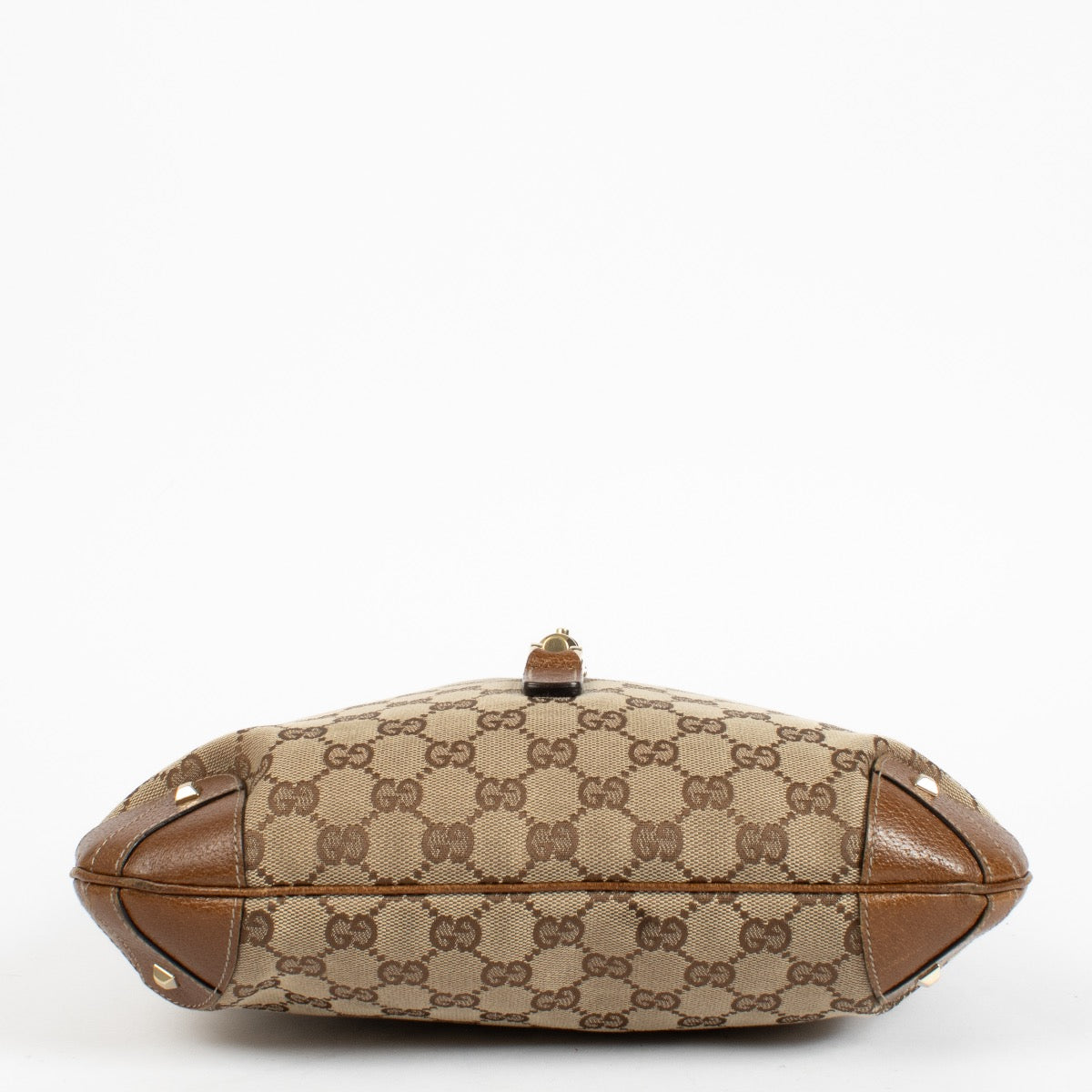 Authentic preloved Gucci GG Canvas Piston Lock Medium Jackie bag on Labellov.com