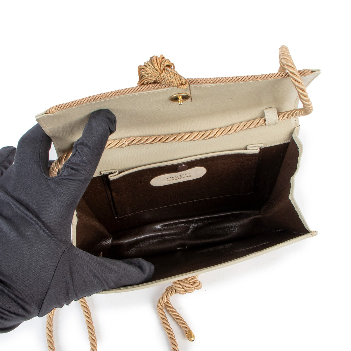 Buy authentic second hand Ferragamo Beige Tassel Rope Strap Flap Crossbody Bag in good condition at Labellov in Antwerp.
