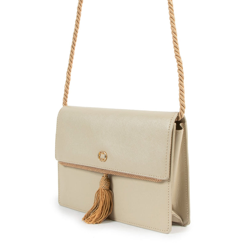 Buy authentic second hand Ferragamo Beige Tassel Rope Strap Flap Crossbody Bag in good condition at Labellov in Antwerp.