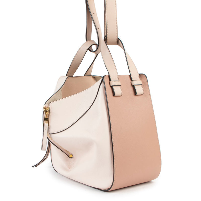 Buy authentic second hand Loewe Small Two-Toned Pink Hammock Bag in very good condition at Labellov in Antwerp.