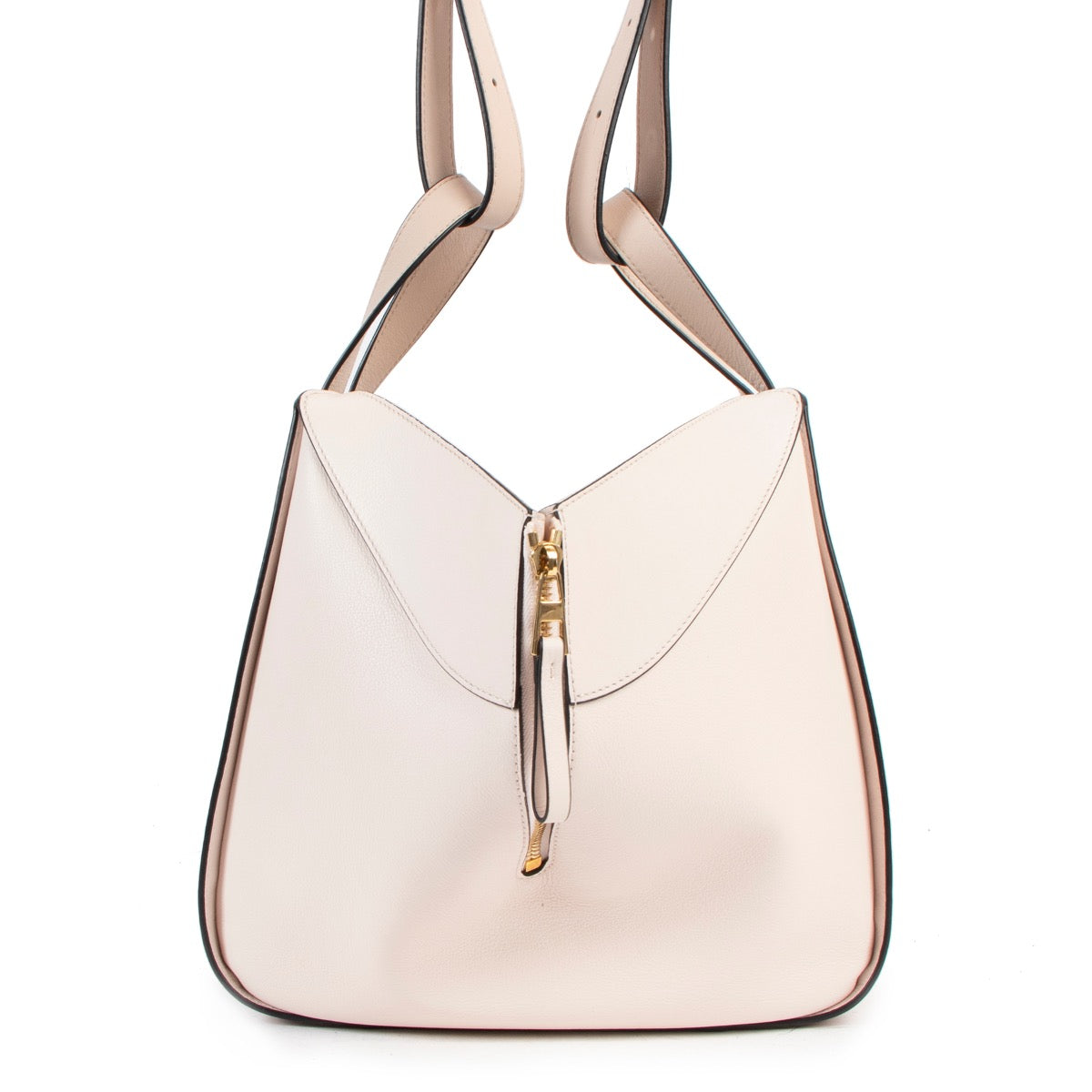 Buy authentic second hand Loewe Small Two-Toned Pink Hammock Bag in very good condition at Labellov in Antwerp.