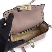 Buy authentic second hand Valentino Pink Garavani Rockstud Crossbody Bag in good condition at Labellov in Antwerp.