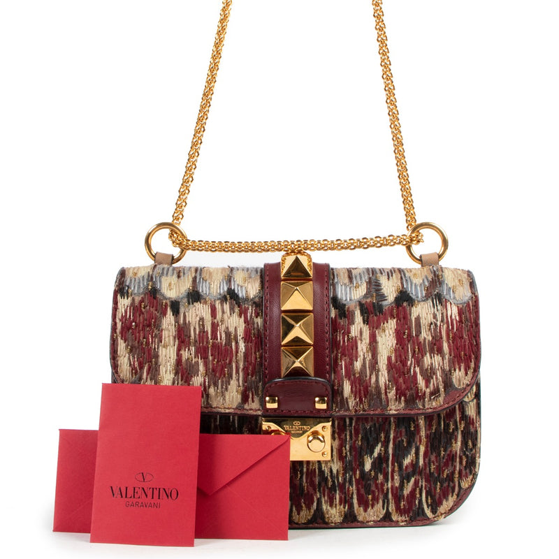 Buy authentic second hand Valentino Garavani Multicolor Teal Glam Lock Rockstud Crossbody Bag in good condition at Labellov in Antwerp.