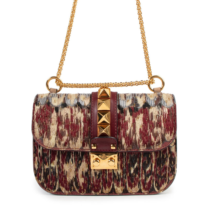 Buy authentic second hand Valentino Garavani Multicolor Teal Glam Lock Rockstud Crossbody Bag in good condition at Labellov in Antwerp.