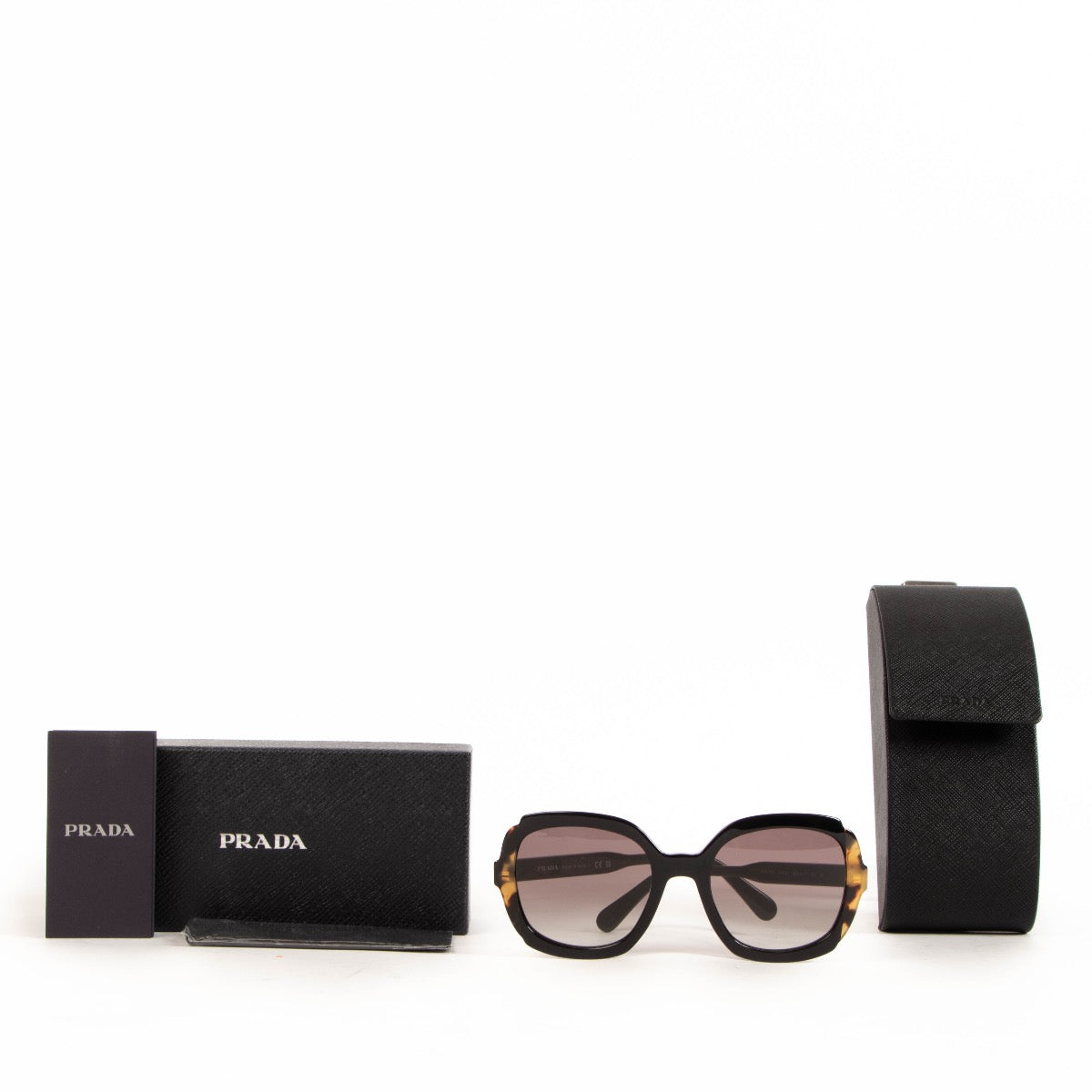 Shop safe online at Labellov in Antwerp, Brussels or Knokke these 100% authentic second hand Prada Black Acetate Sunglasses