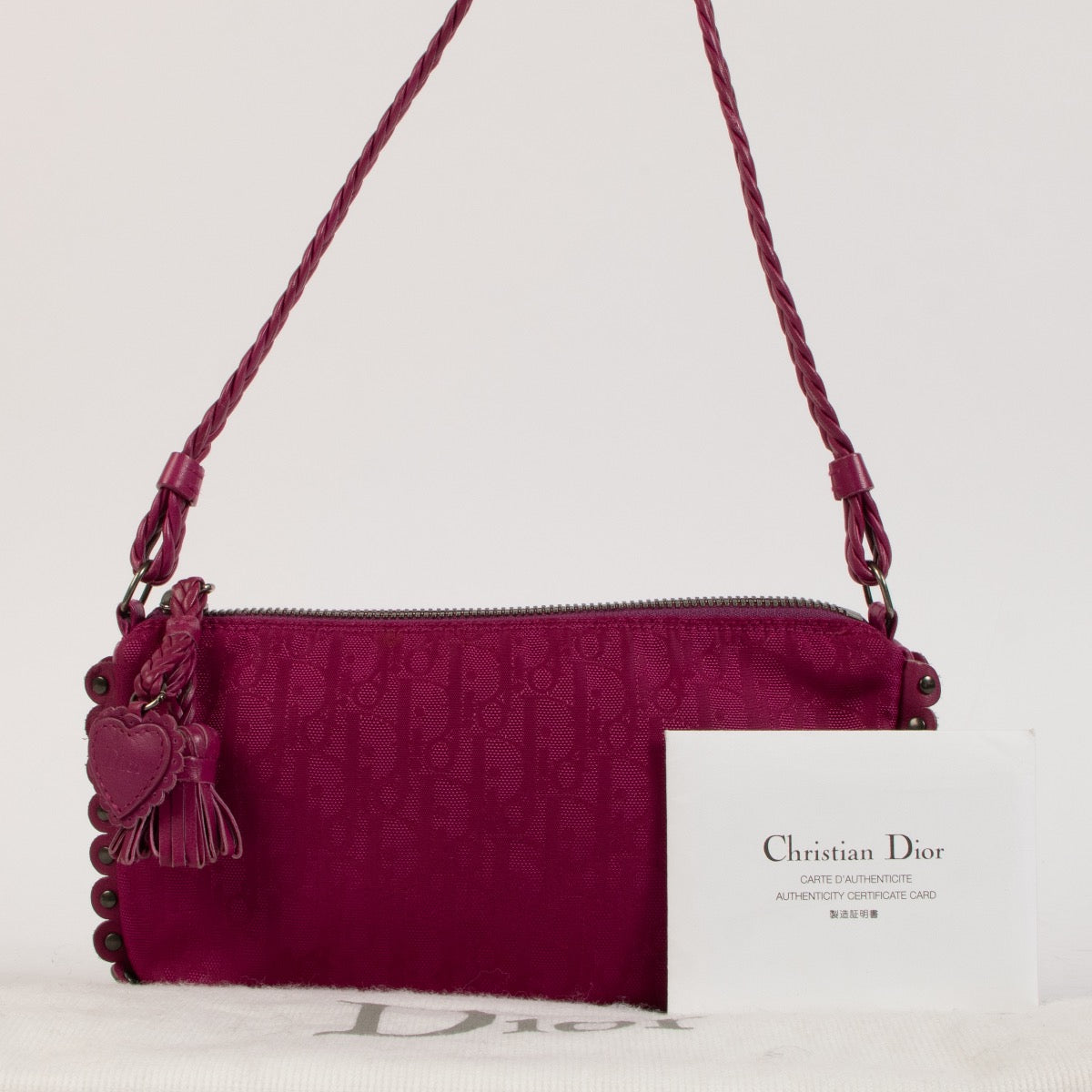 Shop 100% authentic second-hand Christian Dior Pink Diorissimo Ethnic Clutch Bag on Labellov.com