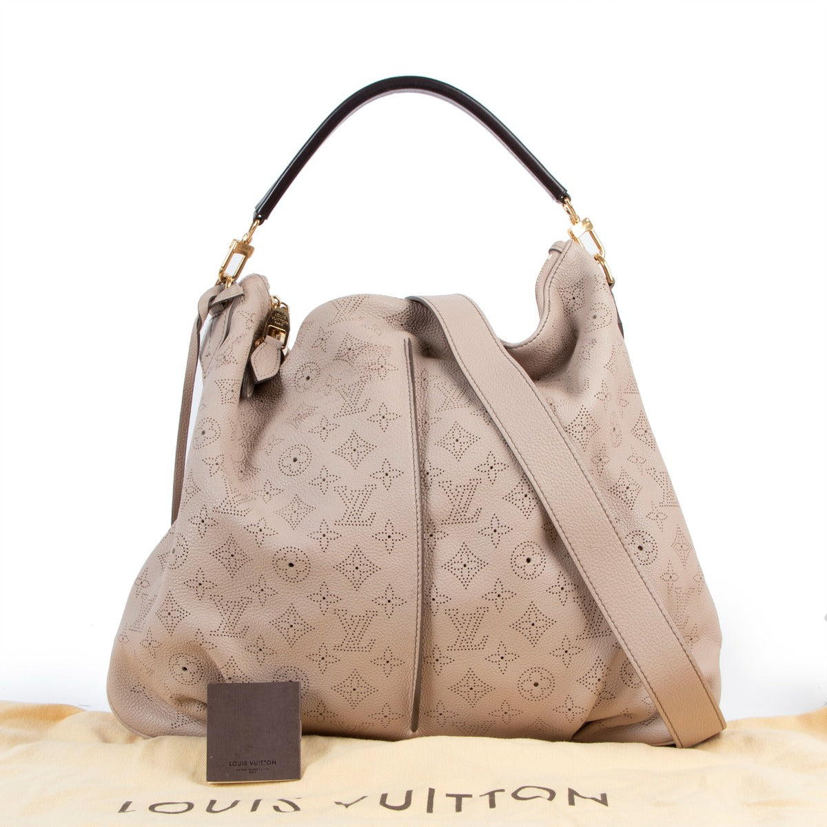 Buy online an authentic second hand Louis Vuitton pink Mahina Selene Perforated Monogram MM shoulder bag in good condition at Labellov in Antwerp.