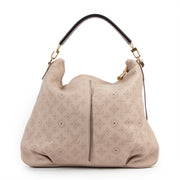 Buy online an authentic second hand Louis Vuitton pink Mahina Selene Perforated Monogram MM shoulder bag in good condition at Labellov in Antwerp.