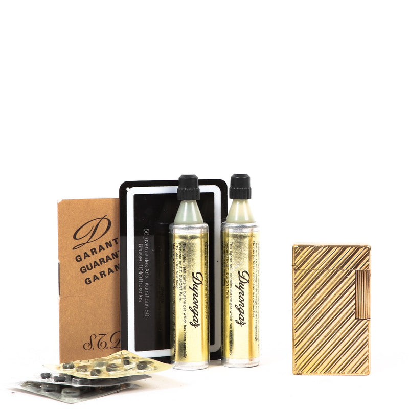 Buy an authentic second hand S.T. Dupont Gold-Plated Lighter in very good condition at Labellov
