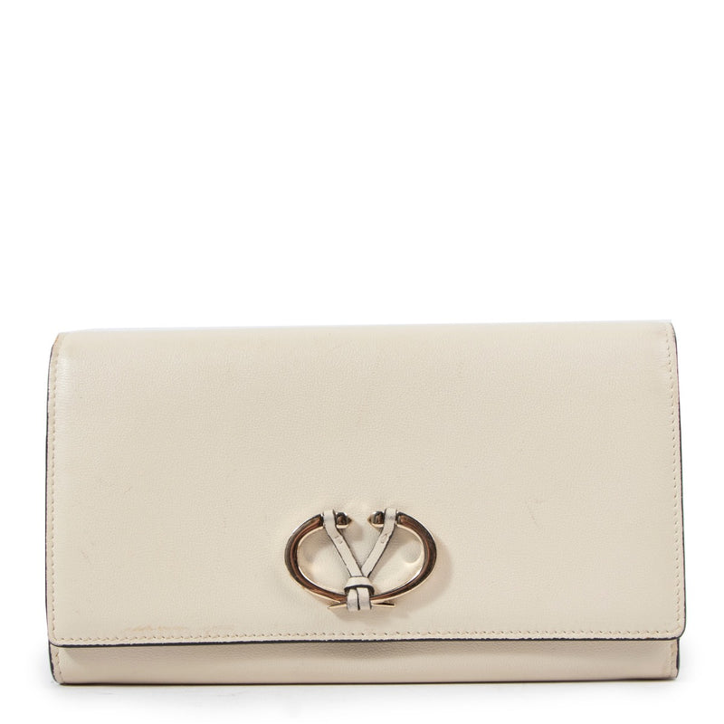 Buy an authentic second hand Valentino Garavani Beige Leather Wallet in good condition at Labellov.com