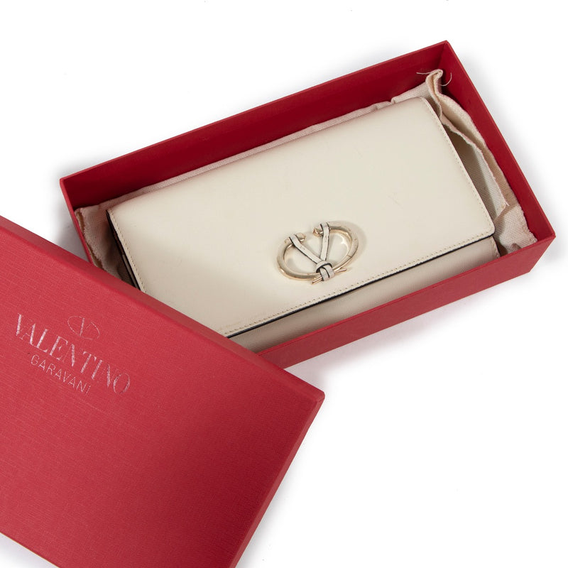 Buy an authentic second hand Valentino Garavani Beige Leather Wallet in good condition at Labellov.com