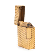 Shop safe online at Labellov in Antwerp this 100% authentic second hand S.T. Dupont Gold Vintage Lighter