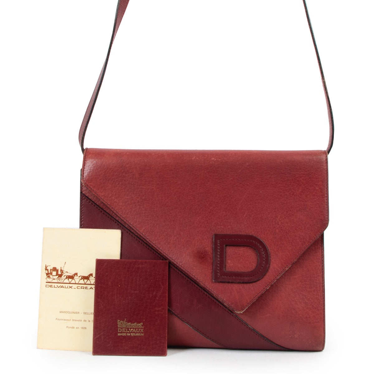 Shop now for your pre-loved, 100% authentic Delvaux Burgundy Leather Crossbody at Labellov.