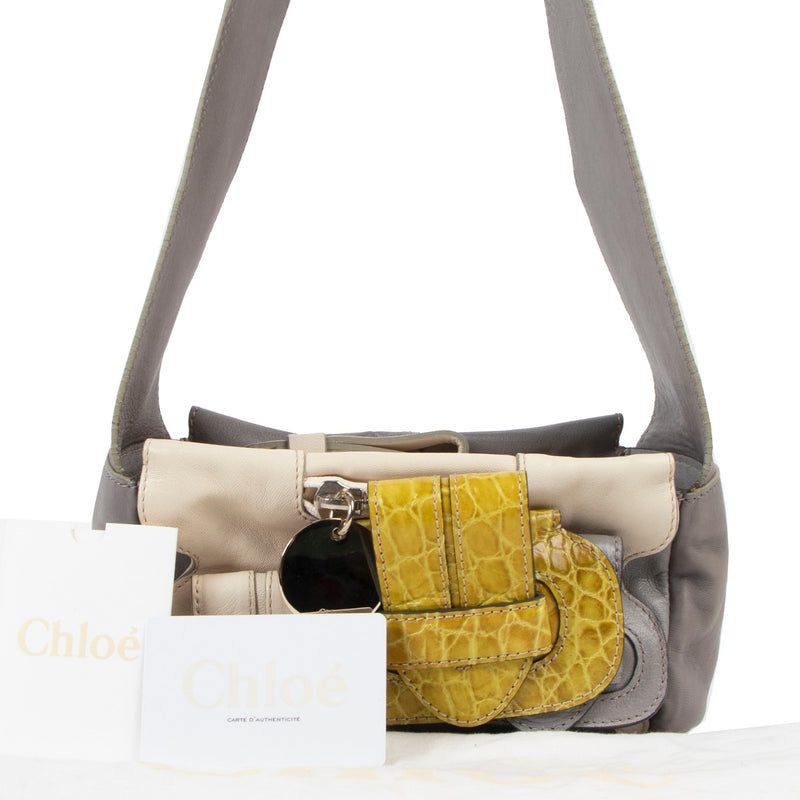 Shop now for your pre-loved, 100% authentic Chloé Grey Embossed Buckle Strap Shoulder bag at Labellov in Antwerp