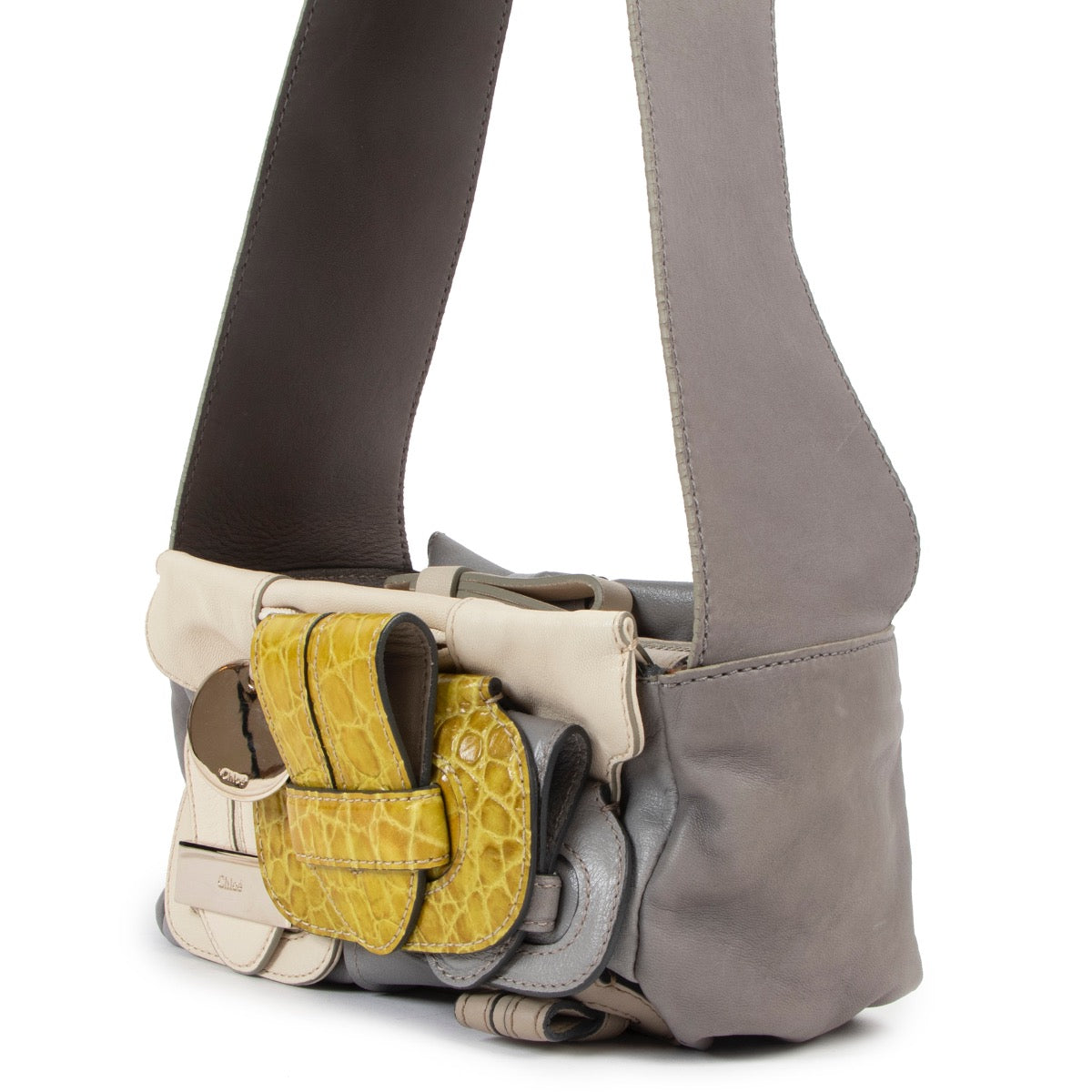 Shop now for your pre-loved, 100% authentic Chloé Grey Embossed Buckle Strap Shoulder bag at Labellov in Antwerp