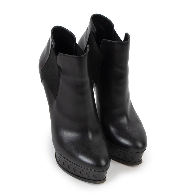 Buy an authentic pair of second hand Casadei Black Leather Boots - Size 38 in very good condition at Labellov