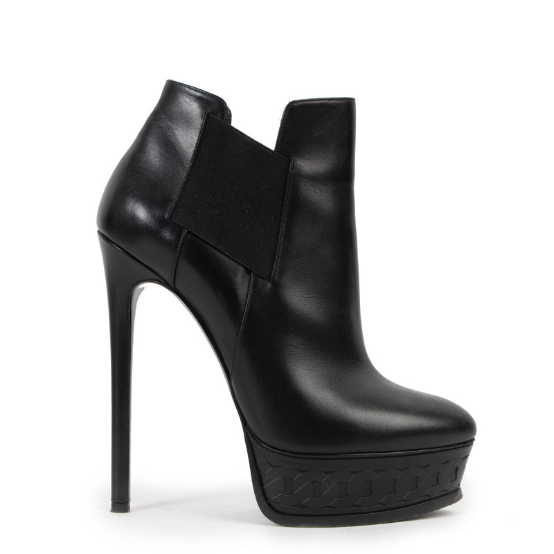 Buy an authentic pair of second hand Casadei Black Leather Boots - Size 38 in very good condition at Labellov