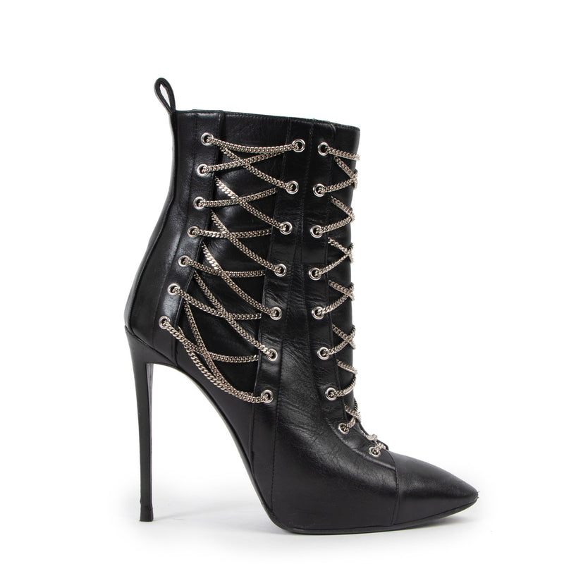 Buy an authentic second hand Guiseppe Zanotti Black/ Chained Boots - Size 37 in good condition at Labellov