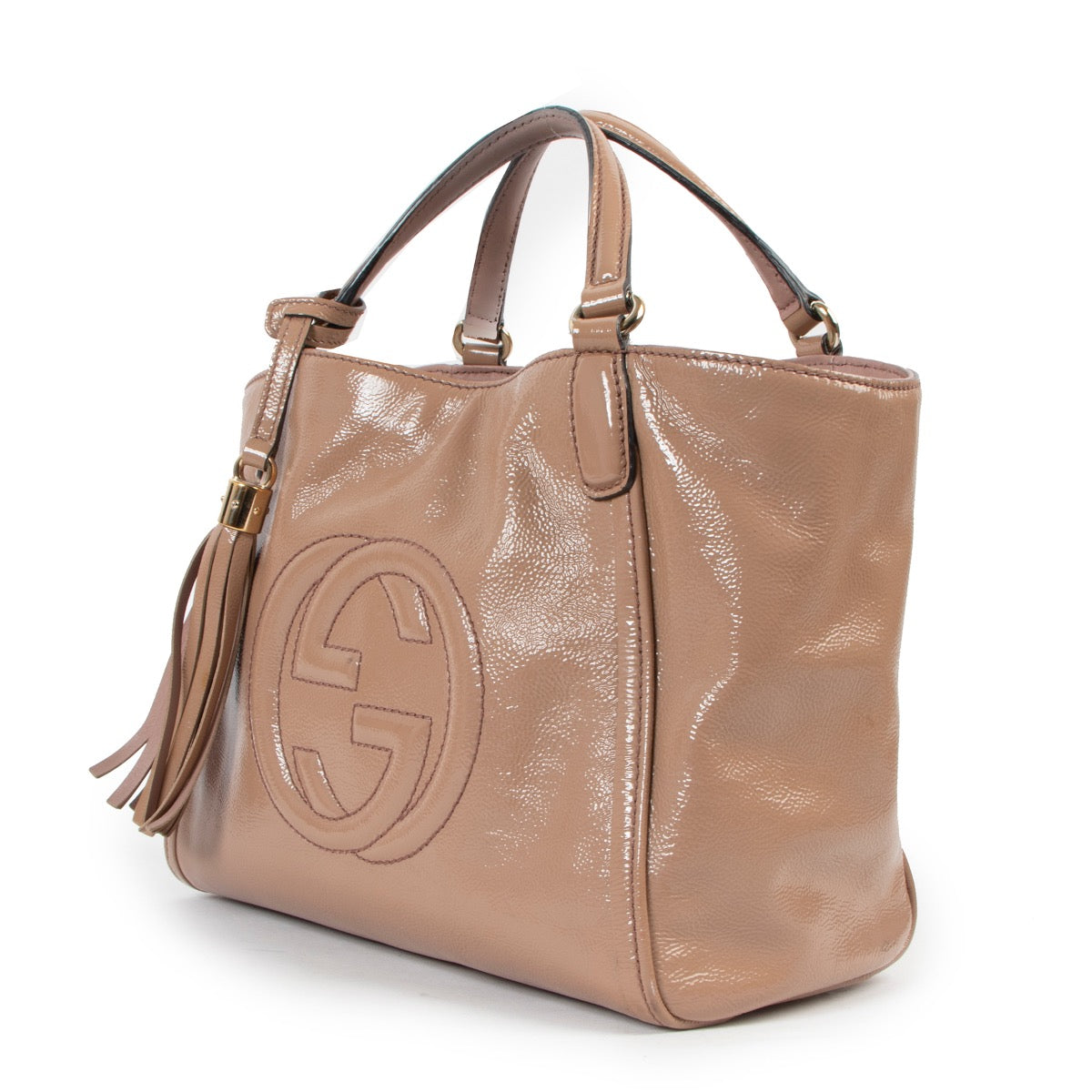 Buy an authentic second hand Gucci Small Pink Patent Leather Soho Cellarius GG Logo Top Handle in very good condition at Labellov.