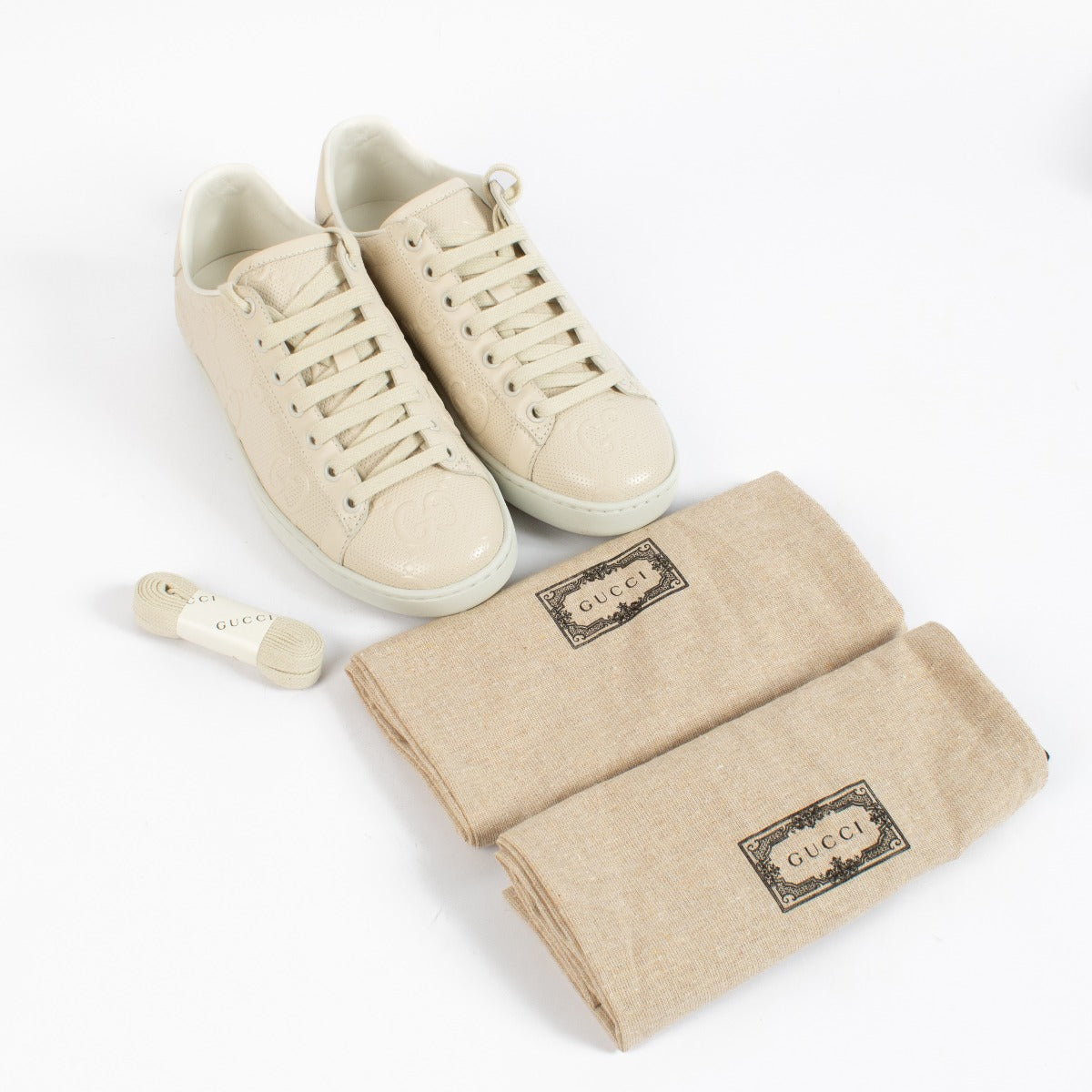 Gucci Beige Ace GG Embossed Sneakers