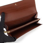 Shop now for your pre-loved, 100% authentic Louis Vuitton Sarah Monogram Wallet at Labellov in Antwerp