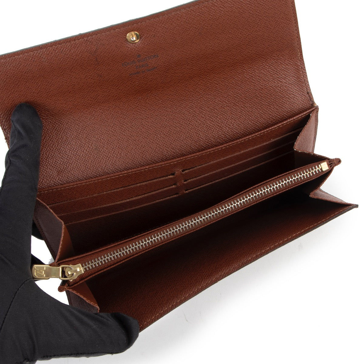 Shop now for your pre-loved, 100% authentic Louis Vuitton Sarah Monogram Wallet at Labellov in Antwerp