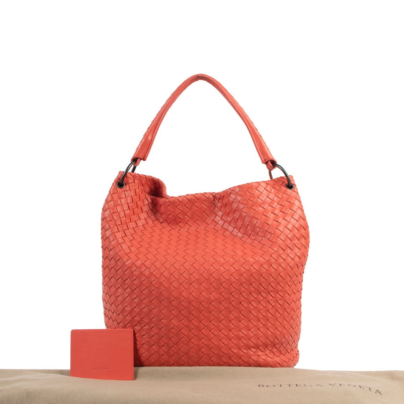 Shop now for your pre-loved, 100% authenticBottega Veneta Orange Intrecciato Nappa Woven Parachute Bag at Labellov.