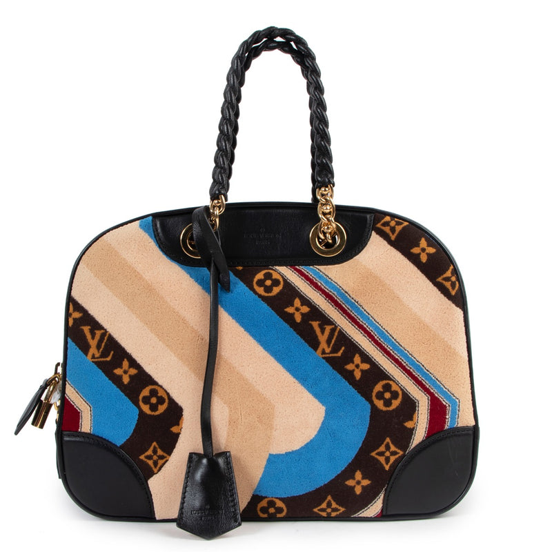 Buy online authentic second hand Louis Vuitton Fall/Winter 2014 Bowling Vanity Tuffet Limited Edition Top Handle Bag in very good condition at Labellov in Antwerp